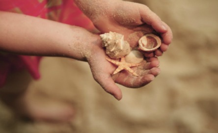 Wet sand play with stones