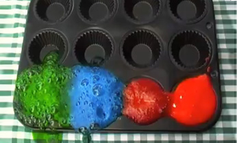 toddler holding science molecule model