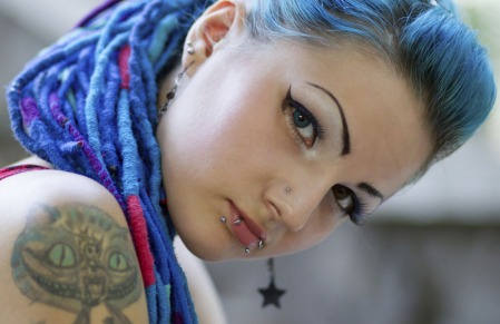 Blue hair, body-piercings